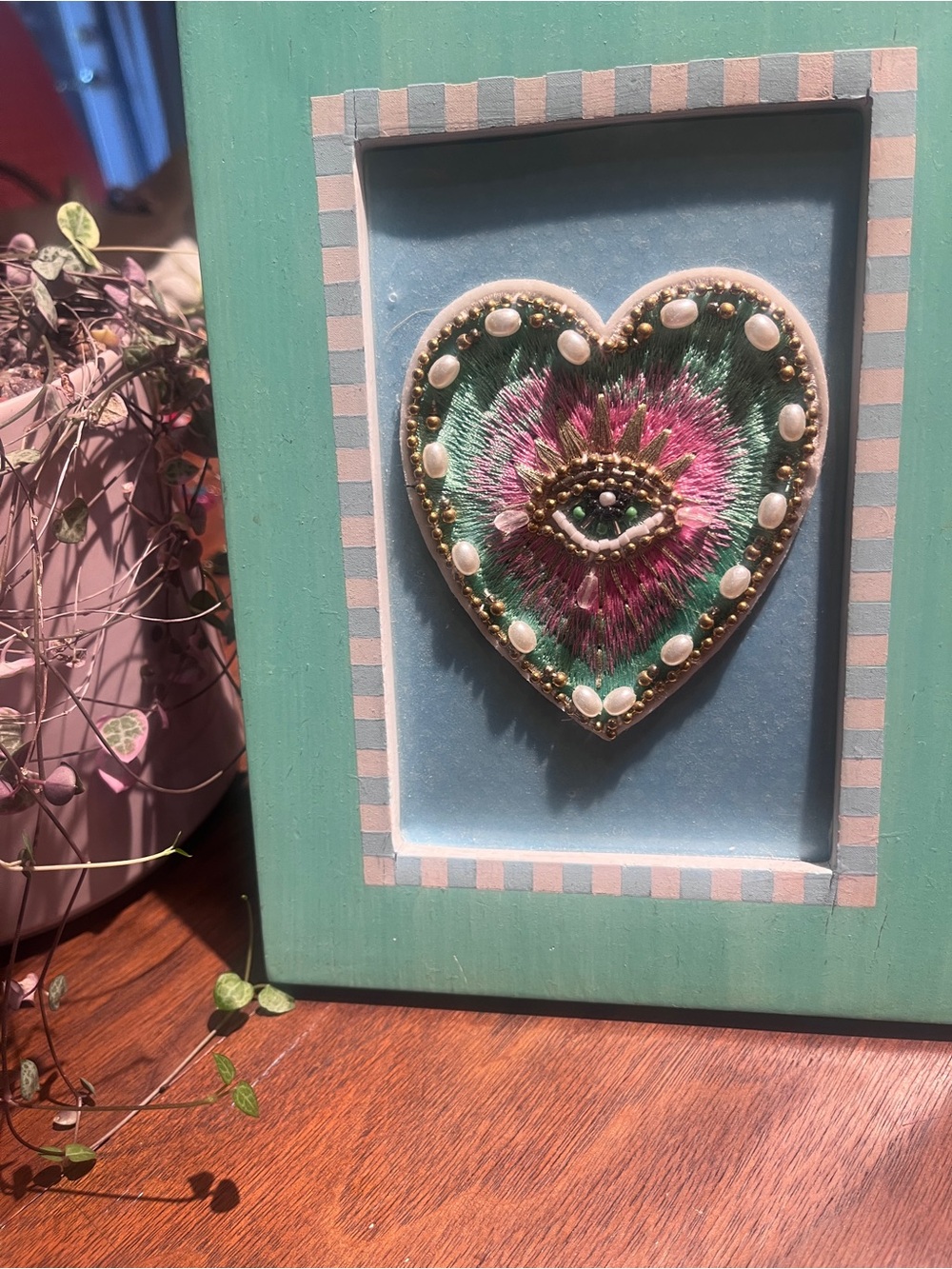 Pastel framed evil eye
